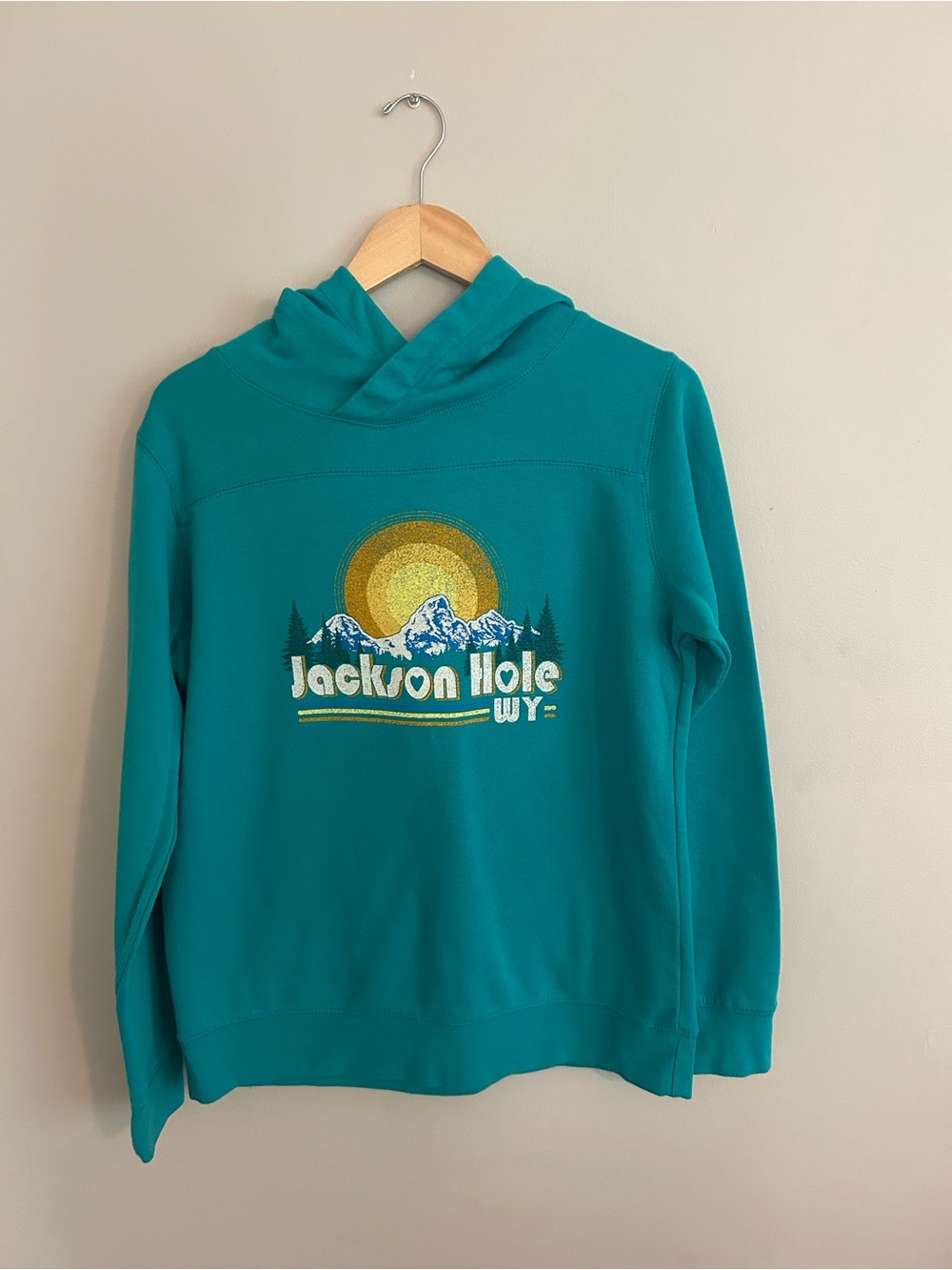 Oura Teal Kids Hoodie with Mountain Sun Graphic